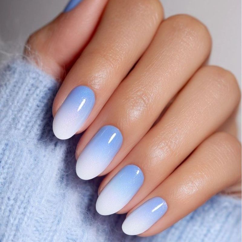 Blue ombre nails fading from soft blue to white, Florence Kentucky nail salon